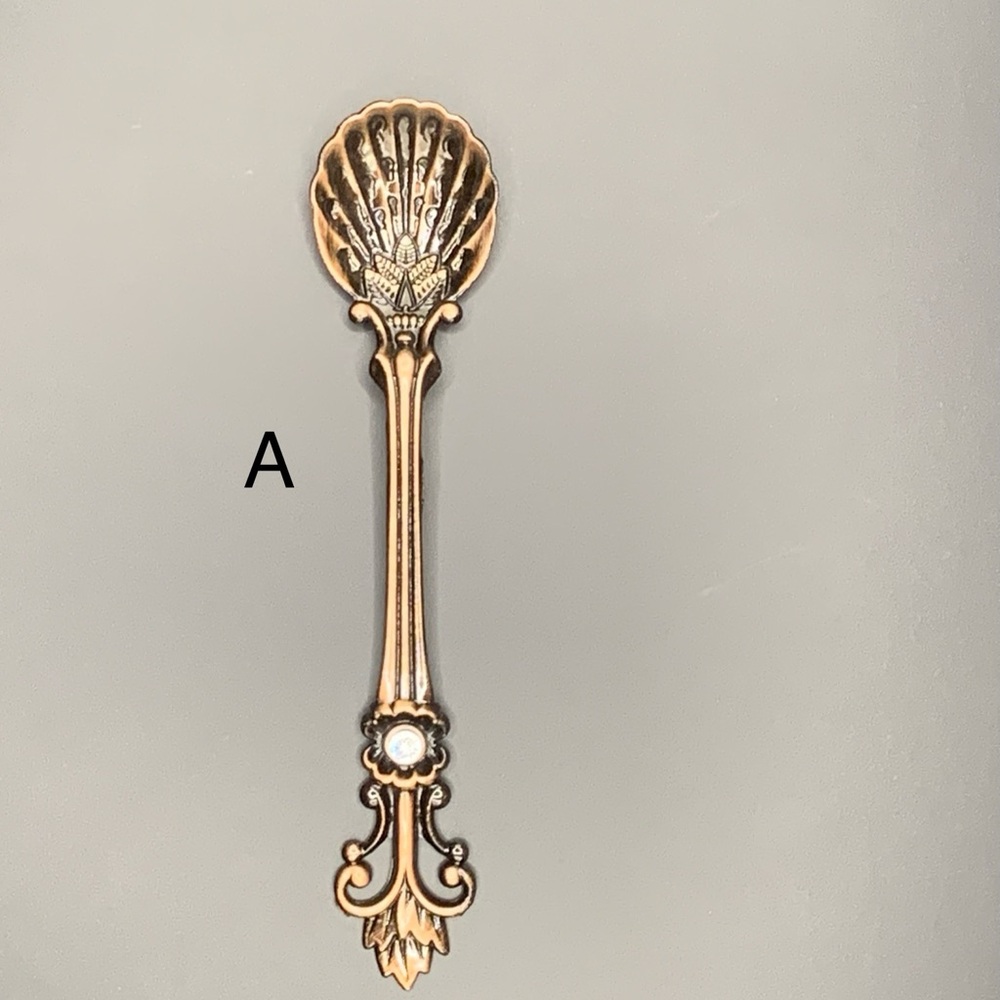 7- Decorative spoons. Wicca. Witch spoons. Copper tone metal spoons.